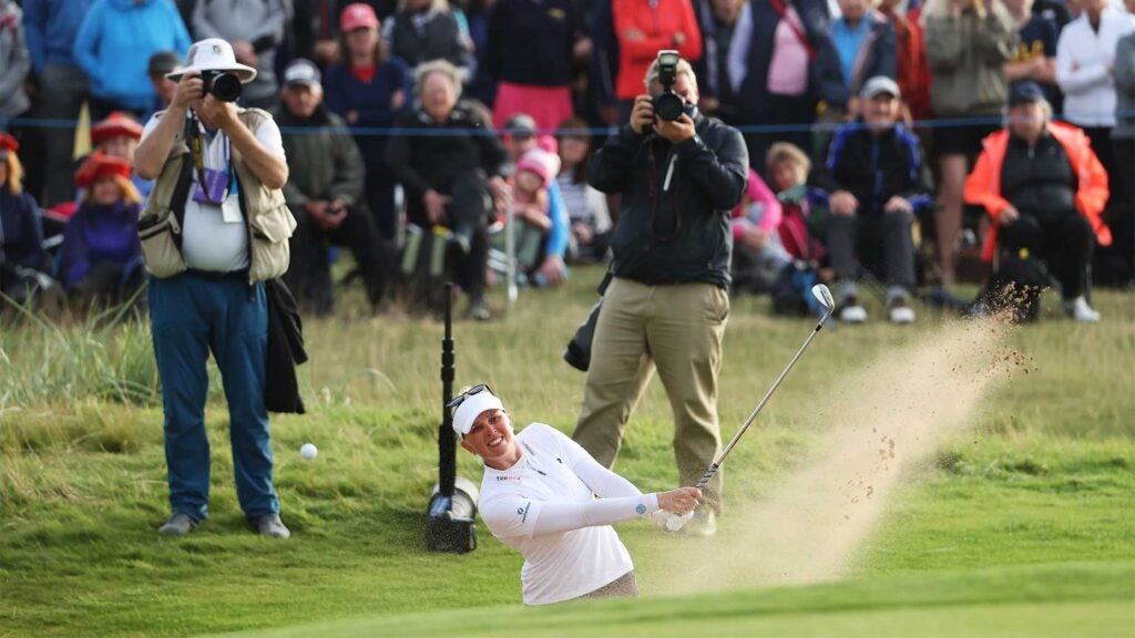 Nanna Koerstz Madsen hits out of the bunker on the 72nd hole of the AIG Women's Open.