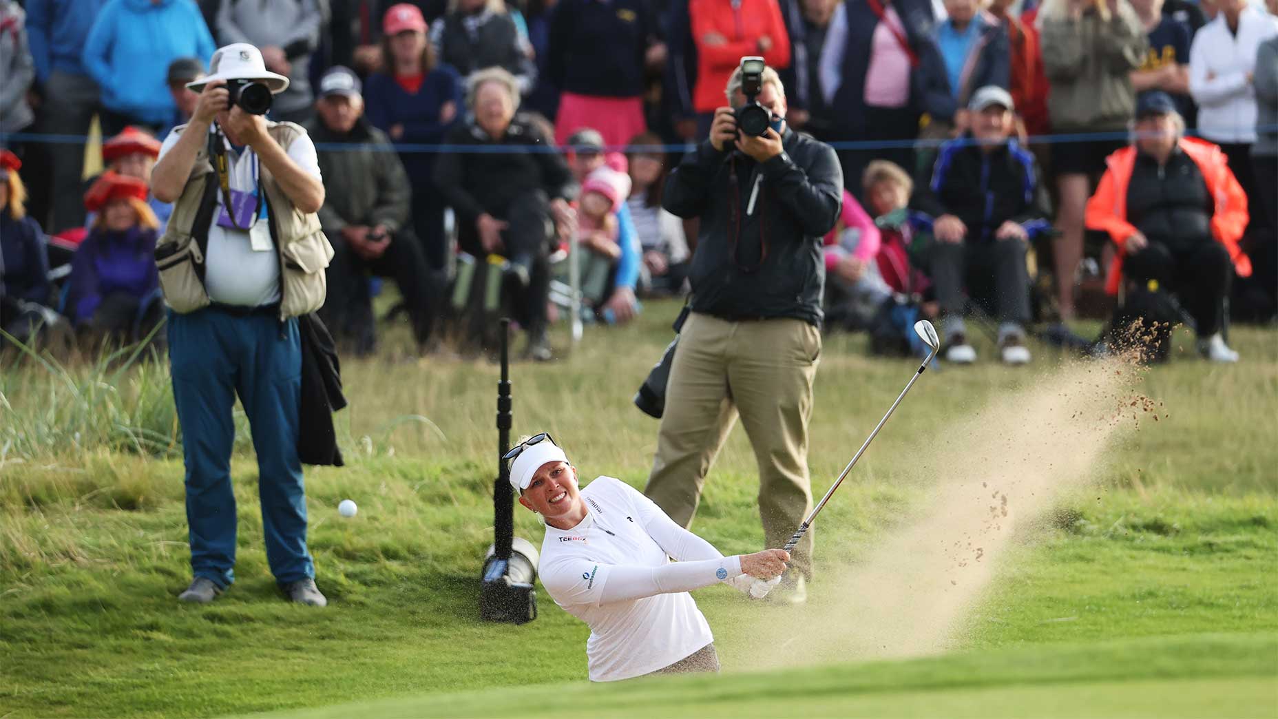 Nanna Koerstz Madsen hits out of the bunker on the 72nd hole of the AIG Women's Open.