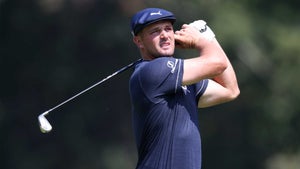 Bryson DeChambeau watches an approach at the BMW Championship.