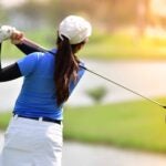 Woman playing golf