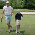 ian poulter stands with his son