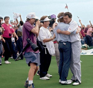 Bernhard Langer and Hale Irwin hug at the end of the 1991 Ryder Cup.