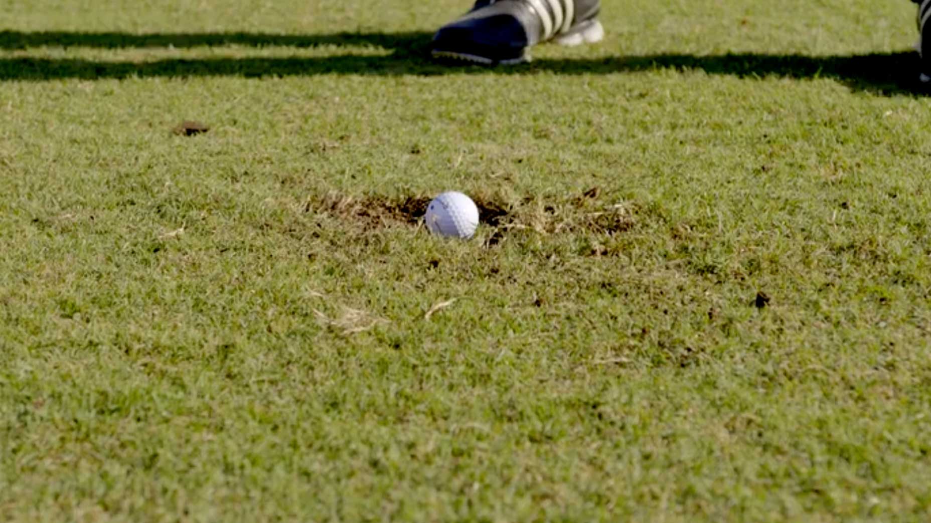How to hit out of a sand-filled divot: 5 steps for hitting out of a nasty  lie