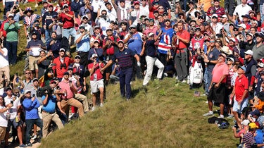 bryson dechambeau watches a shot at the ryder cup