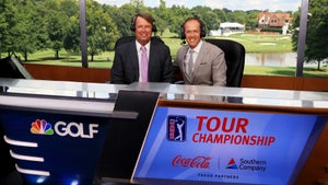 two men sit in broadcast booth