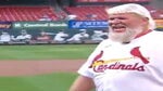 John Daly throws out the first pitch at the St. Louis Cardinals game.
