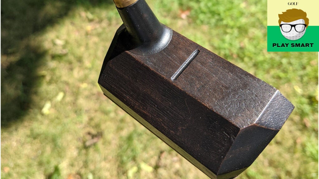 A wooden putter.