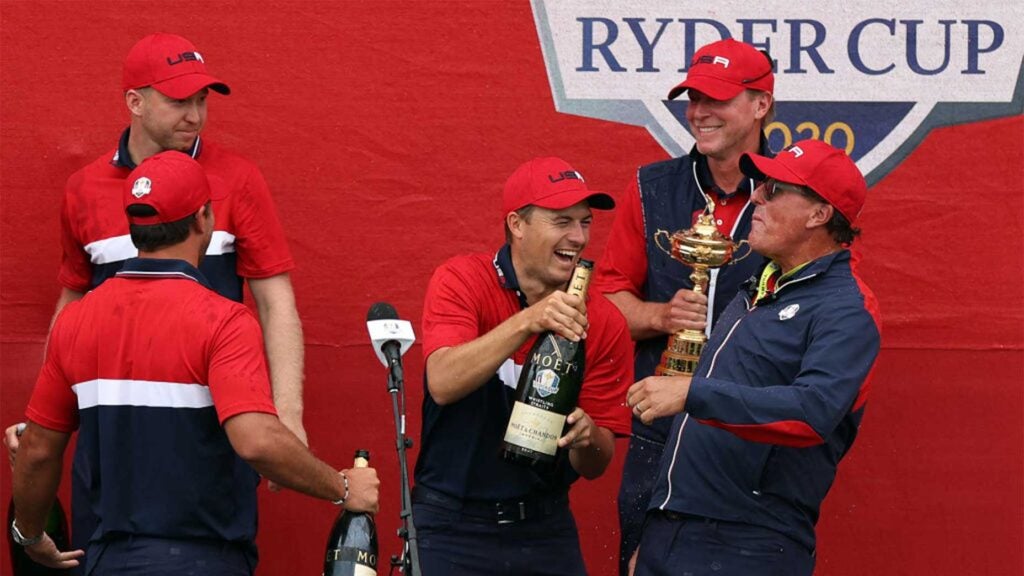 the us ryder cup team celebrates.