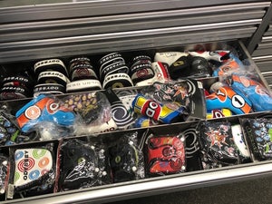 Putter covers on the Callaway tour equipment truck.