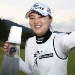 Jin Young Ko takes a selfie with her latest trophy