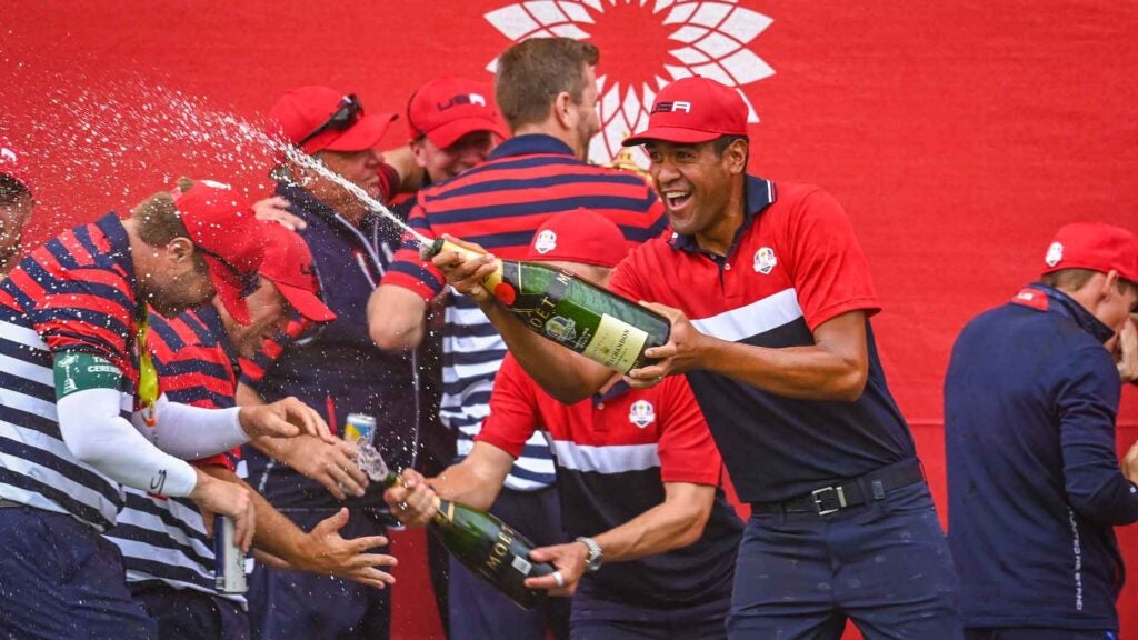 Tony Finau sprays chamapgne in celebration at the 2021 Ryder Cup