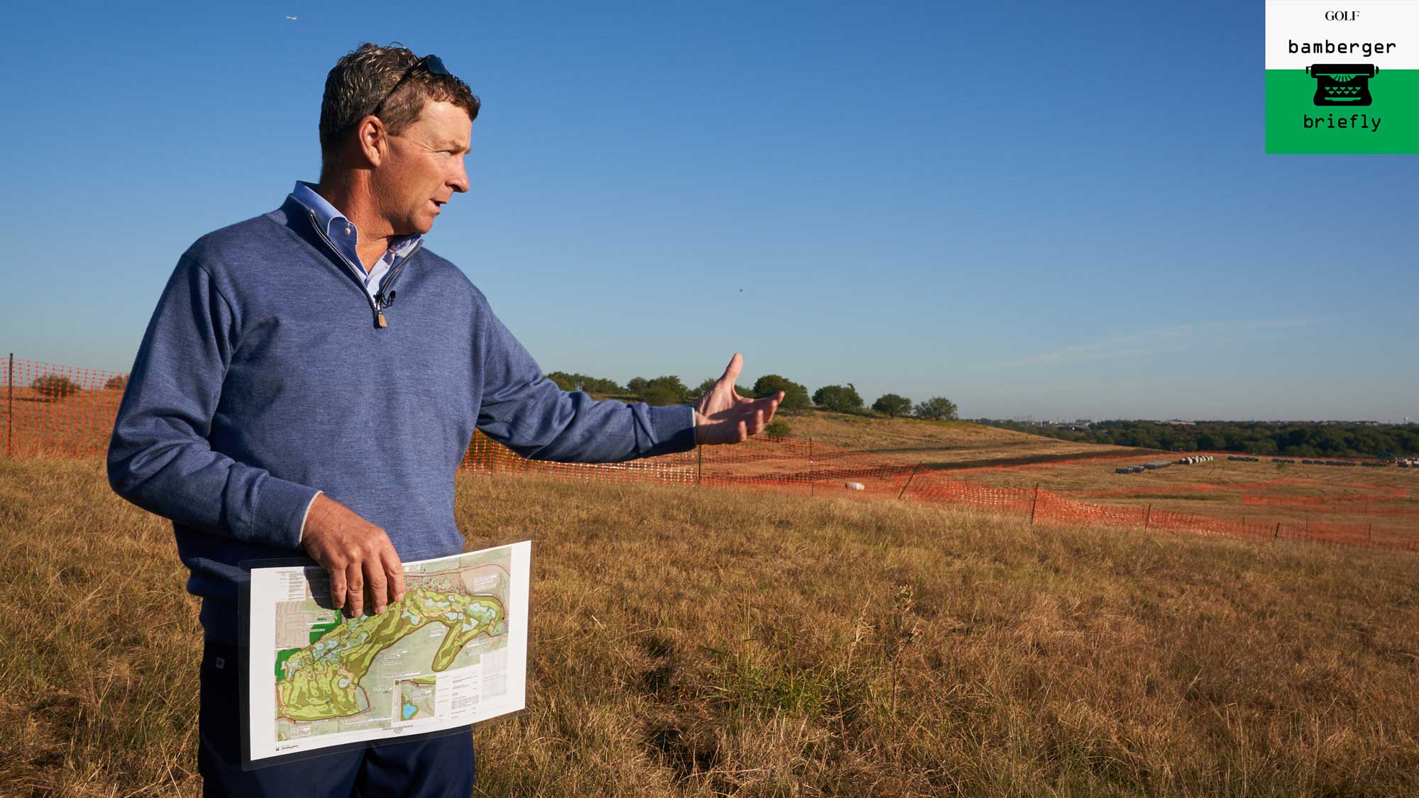 gil hanse holding a course map