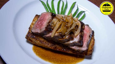 Baltusrol's popular steak sandwich on a plate