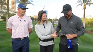 LAS VEGAS, NEVADA - NOVEMBER 26: Amanda Balionis presents Brooks Koepka (R) with a bracelet after beating Bryson DeChambeau during Capital One's The Match V: Bryson v Brooks at Wynn Golf Course on November 26, 2021 in Las Vegas, Nevada. (Photo by David Becker/Getty Images for The Match)