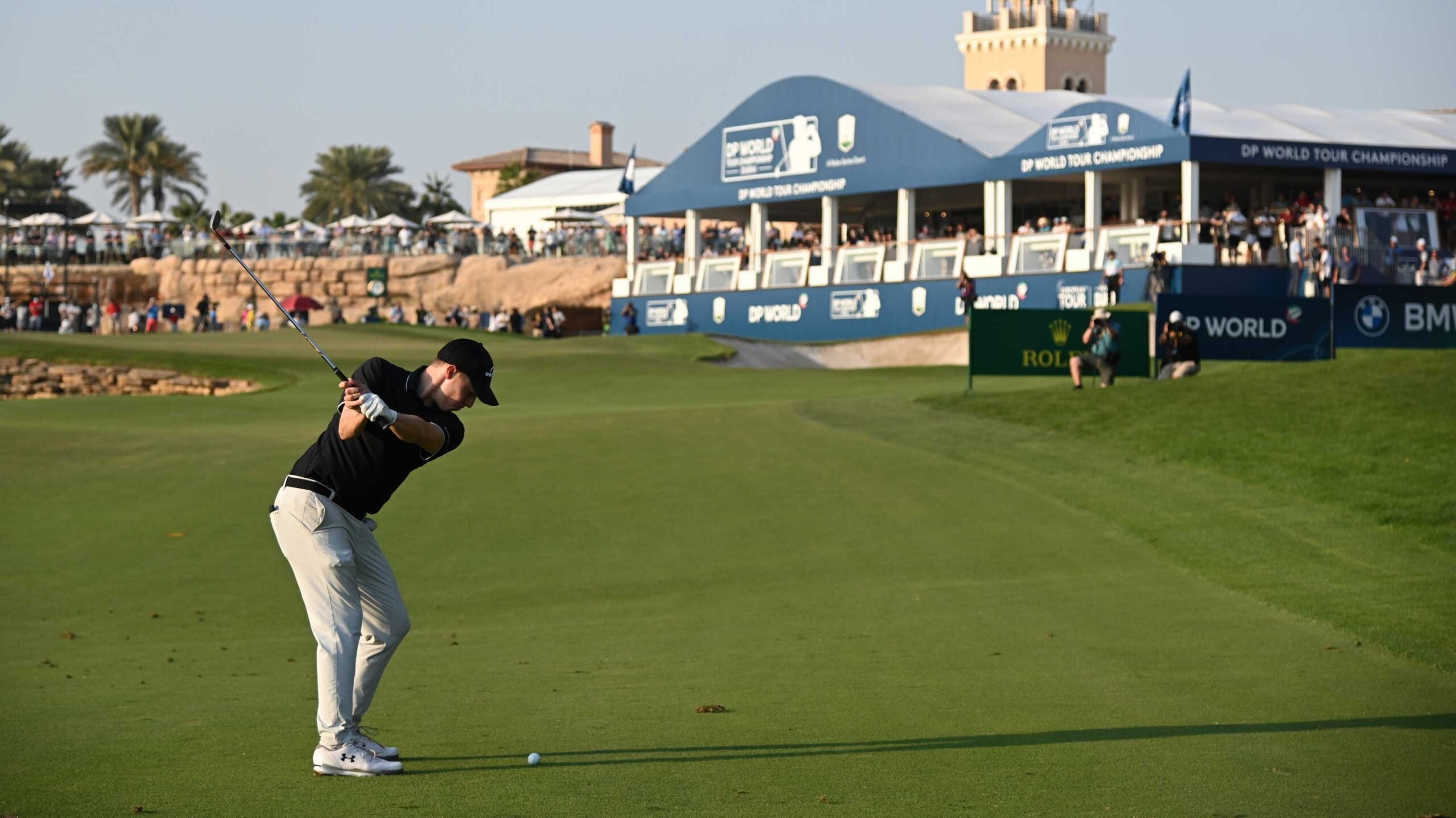 Matthew Fitzpatrick of England plays his third shot on the 18th hole during Day 4 of the DP World Tour Championship at Jumeirah Golf Estates on December 13, 2020 in Dubai, United Arab Emirates.