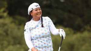 christina kim laughs during an lpga golf tournament