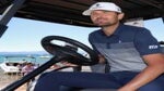 Mardy Fish sits in a golf cart