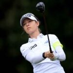 Nelly Korda watches her drive