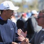 Sean Foley talks to Tiger Woods