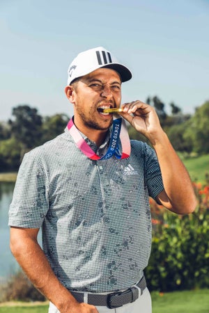 Xander Schauffele with his gold medal.