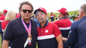 Xander Schauffele and his father Stefan celebrating a Ryder Cup victory.