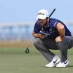 Denny McCarthy reads a putt during the 2021 RSM Classic