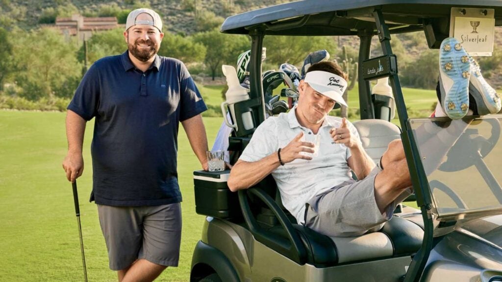drew stoltz and colt knost with a golf cart
