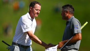 Jimmy Walker of the United States shakes hands with Ryan Palmer of the United States after finishing their round during the first round of the RBC Canadian Open at Hamilton Golf and Country Club on June 06, 2019 in Hamilton, Canada