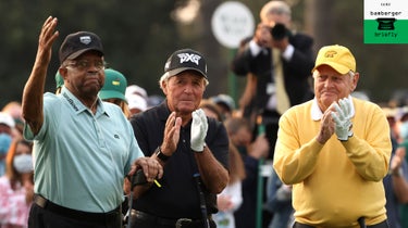 Honorary Starter Lee Elder of the United States (L), waves to the patrons as he is introduced and honorary starter and Masters champion Gary Player of South Africa and honorary starter and Masters champion Jack Nicklaus applaud from the first tee during the opening ceremony prior to the start of the first round of the Masters at Augusta National Golf Club on April 08, 2021 in Augusta, Georgia