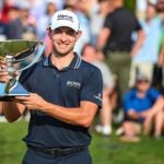 Patrick cantlay holding a fedex cup