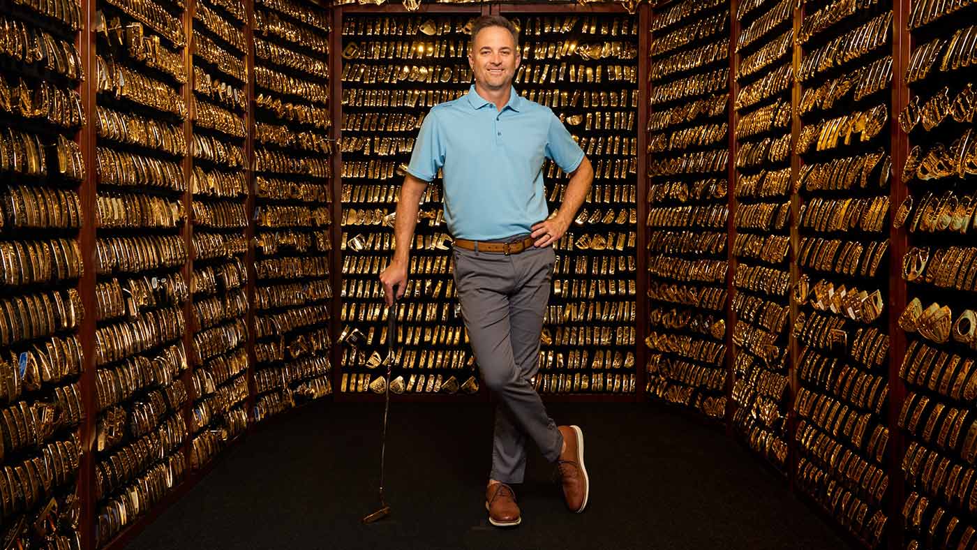 John K. Solheim, Ping chairman-to-be, standing guard over the future company - and its distinguished Gold Putter Vault - at HQ.