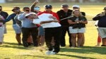 Scottie Scheffler hits a shot surrounded by fans at the 2021 Houston Open