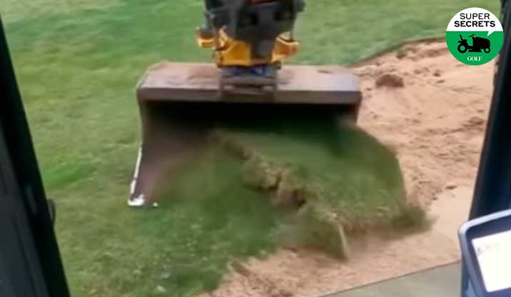 digger ripping up turf