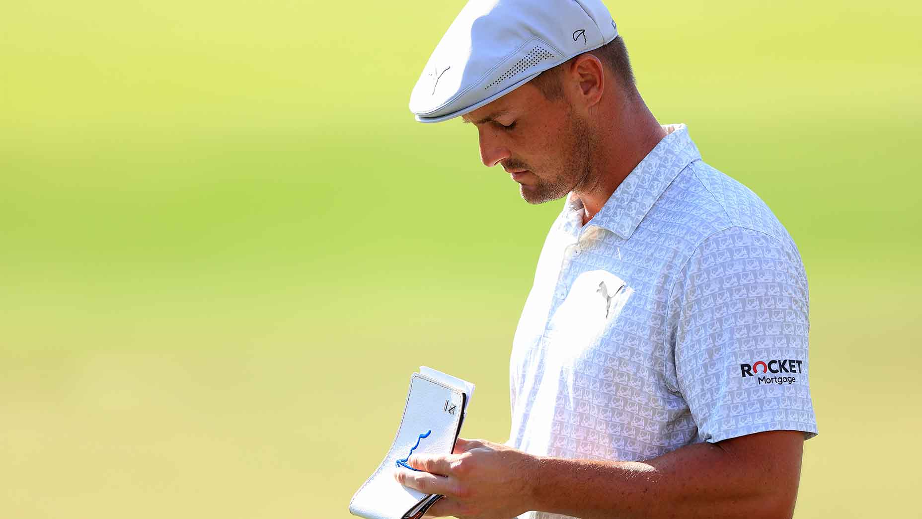 bryson dechambeau looks yardage book