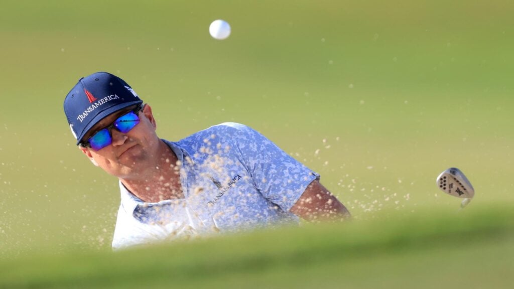 Zach Johnson plays bunker shot during the 2021 RSM Classic at Sea Island