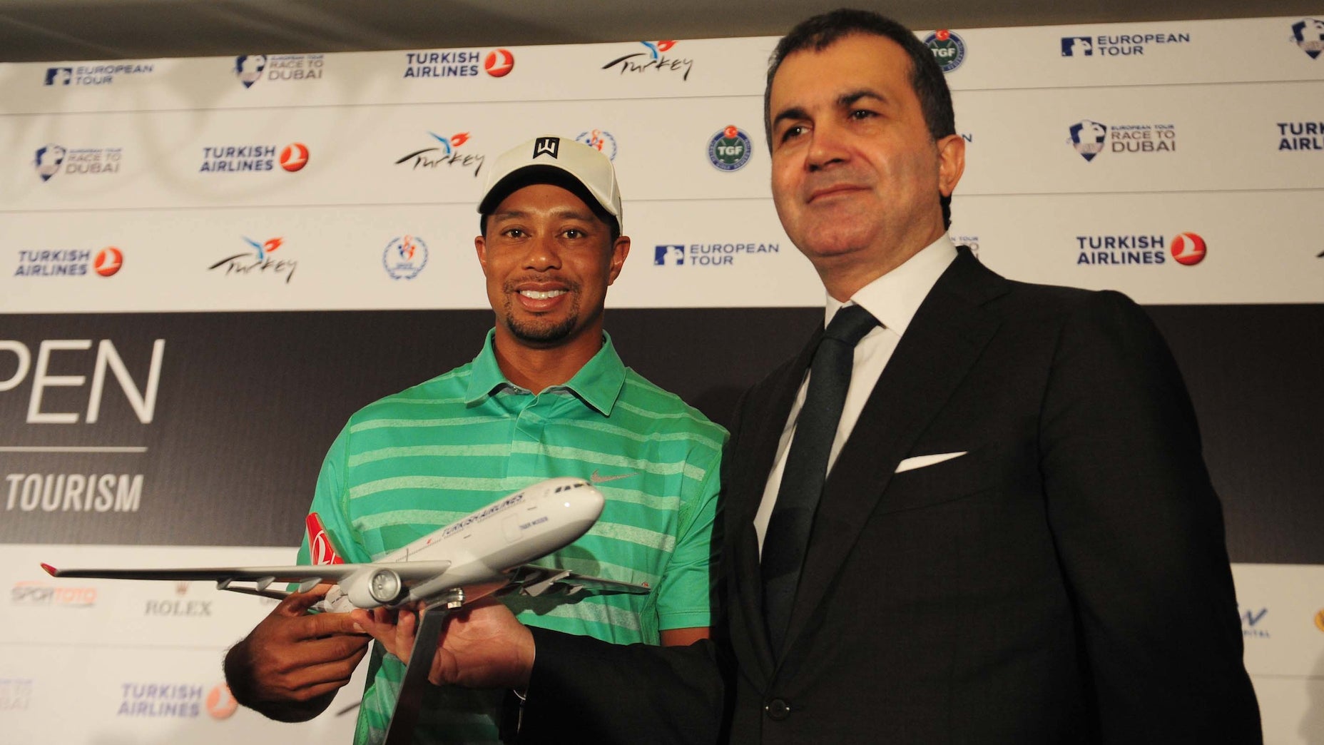 This photo is from 2013 and has very little to do with this story other than the fact that it features Tiger Woods and an airplane.