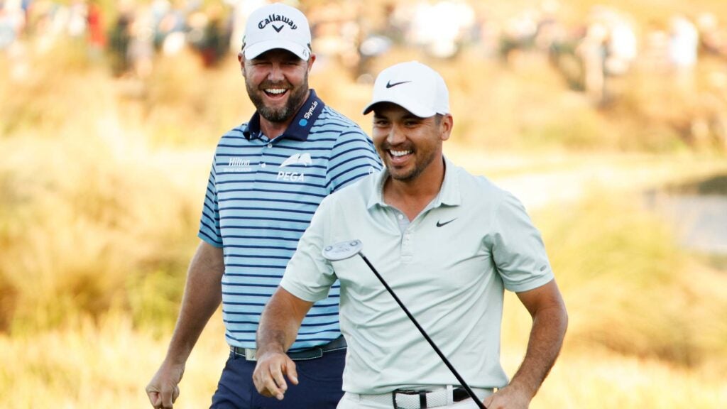 Jason Day and Marc Leishman laugh on the golf course during the 2021 QBE Shootout