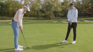 nelly korda and zephyr melton on putting green