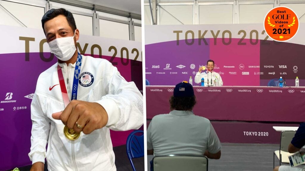 Golfer Xander Schauffele poses with his Olympic gold medal at 2020 Tokyo Olympics