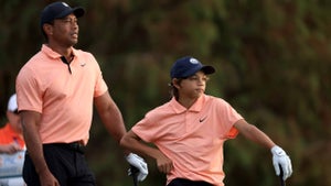tiger and charlie woods stand
