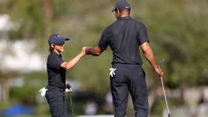 tiger and charlie woods fist pump