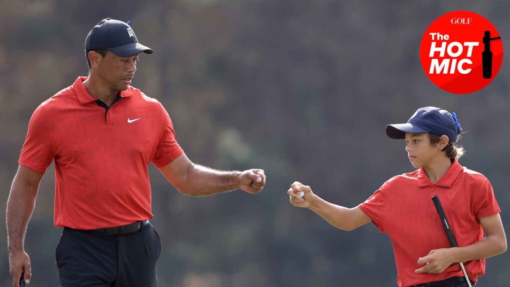 tiger and charlie woods bump fists