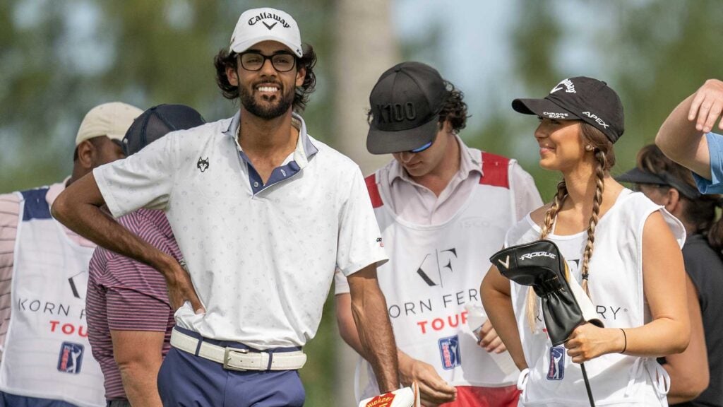 Akshay Bhatia, with girlfriend Presleigh Schultz, waits to tee off at The Bahamas Great Exuma Classi.