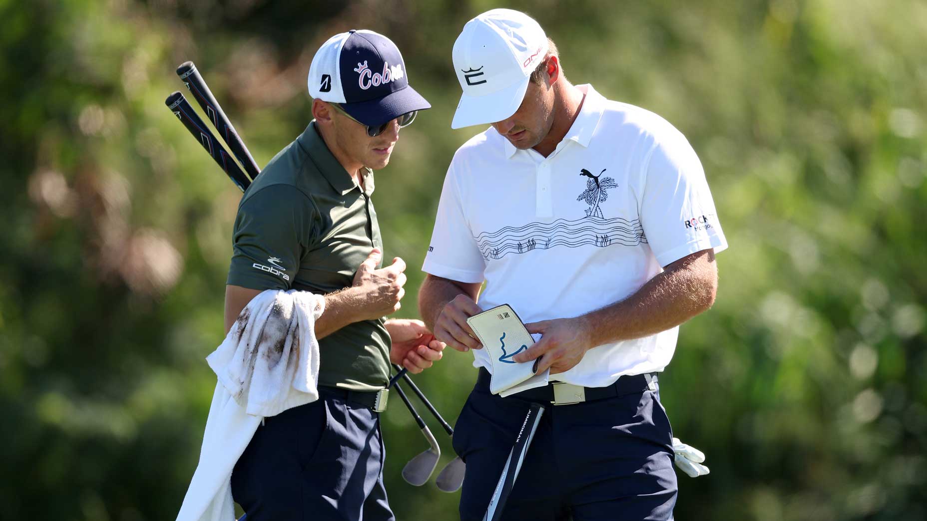 Why do golfers carry a notepad?