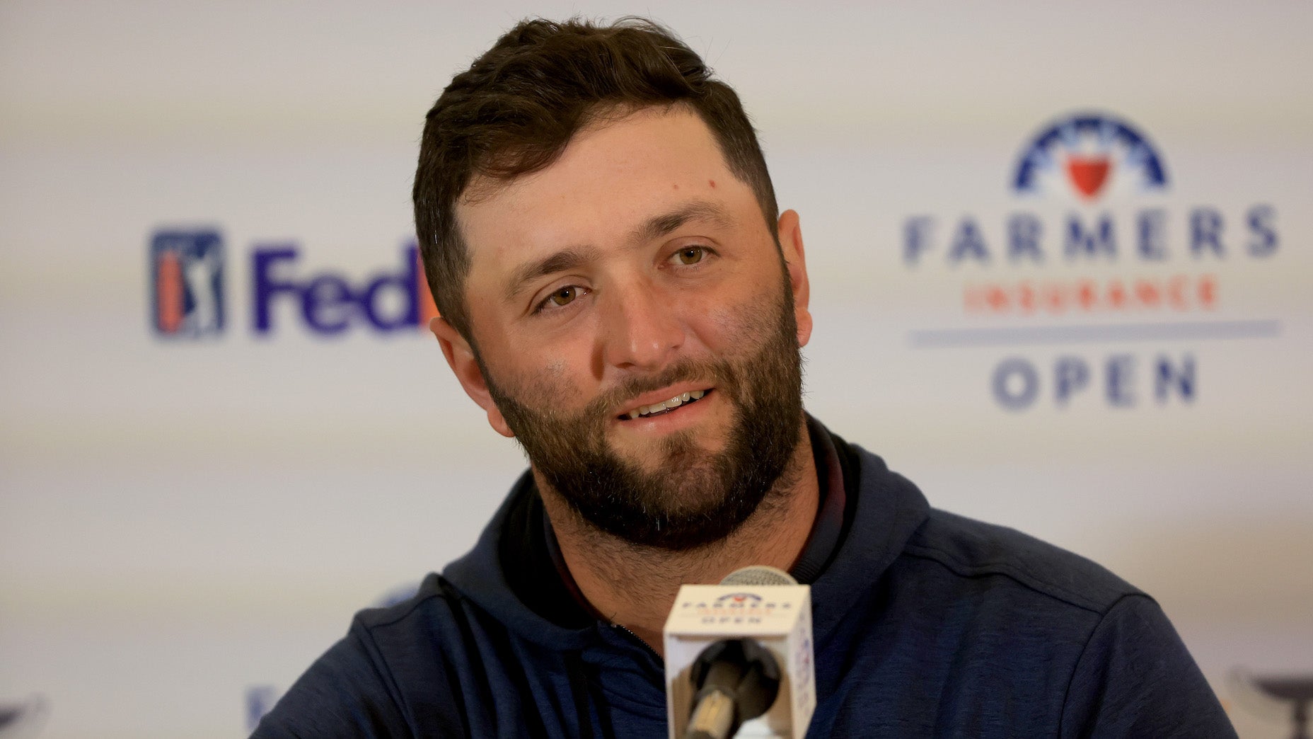 LA JOLLA, CALIFORNIA - JANUARY 25: Jon Rahm of Spain speaks to the media prior to The Farmers Insurance Open at Torrey Pines Golf Course on January 25, 2022 in La Jolla, California. (Photo by Sam Greenwood/Getty Images)