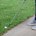 golf ball near cart path