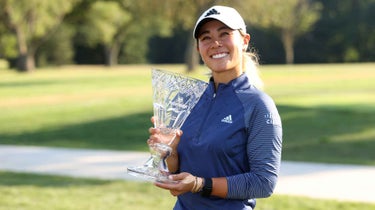 Danielle Kang poses with trophy