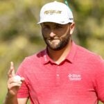 Jon Rahm waves to crowd after making putt at 2022 Tournament of Champions
