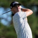 Justin Thomas hits an iron shot during a recent PGA Tour event