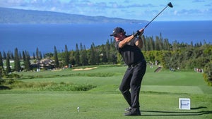 Phil Mickelson hits drive on 17th tee at Kapalua's Plantation Course